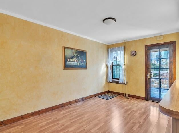 dining area open to the kitchen and with doors to garden