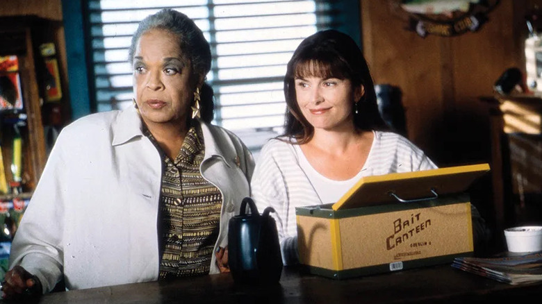 Della Reese as Tess stands next to Roma Downey as Monica in Touched by and Angel