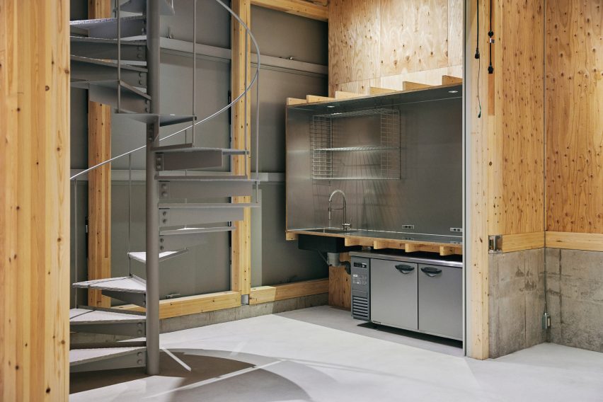 A sink inside office by Schemata Architects