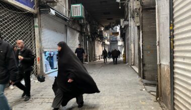 Security forces clash with protesters in Iran's main market : NPR