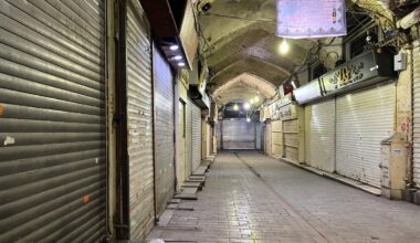 Security forces clash with protesters in Iran's main market