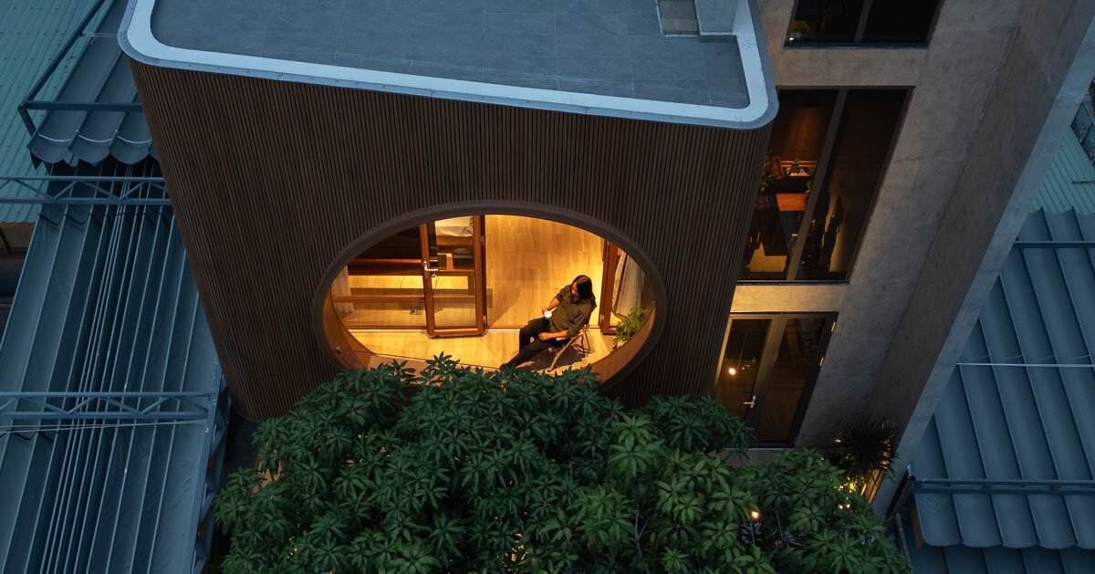 vespa-inspired curved geometry shapes vietnam residence clad in wood