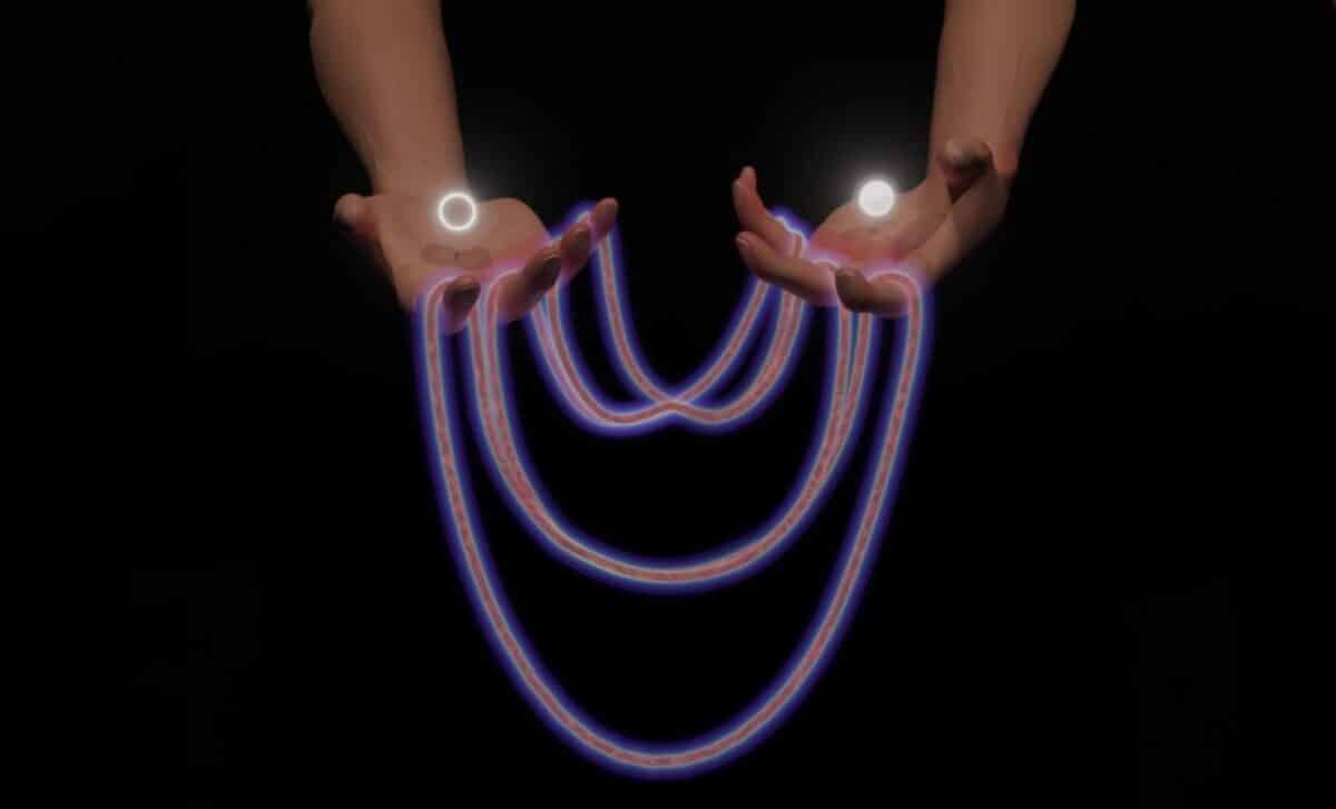 Visualizing Excitonic Floquet Effects Hands Cradle Energy Bands With Mexican Hat Dispersion And Paired Electron Hole Orbs © Jack Featherstone