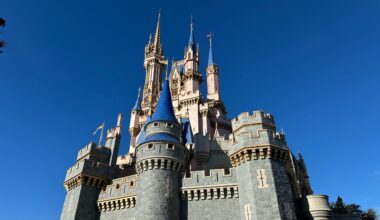 Work has begun on the Cinderella Castle repainting project at Magic Kingdom. A small portion is painted light gray.