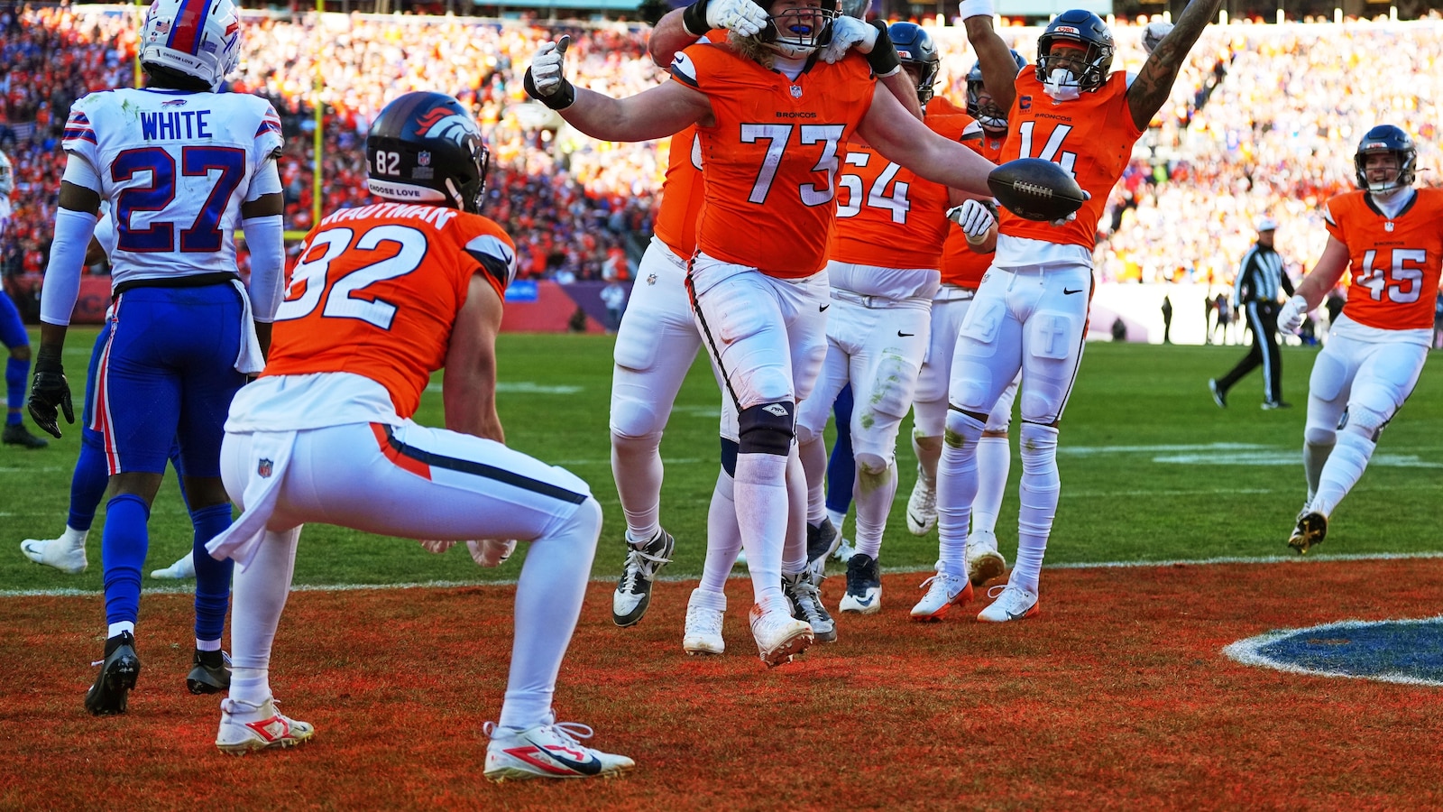 Broncos beat Bills in OT, Seahawks rout 49ers to advance to conference championships