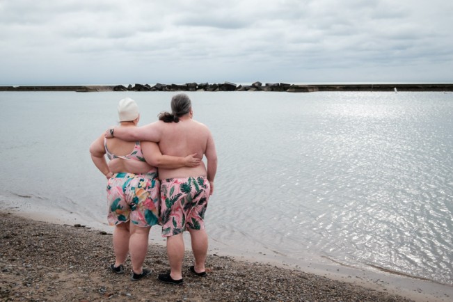 I wrote about photography and change last week, a fitting segue into this week's post.  I photographed my first polar plunge on January 1, 2024.  It was always a fun event with silly hats and tiaras; superheroes and mythological creatures.  I always looked forward to seeing what the members of @beardedvillanstoronto would conjure up: imagine big, burly, bearded men dressed as ballerinas, Vikings and (one year) as sexy lumberjacks — you could never guess what they would come up with! Although all events were cancelled during the pandemic years, I still went down to the lake to capture committed "dippers" taking the plunge in small groups of two and three - no costumes, no hype.  At that time taking the plunge was an opportunity to just do something silly and laugh at a time that was decidedly not fun.  On New Year's Day this year, I photographed two different plunges and I only just noticed that the events have changed since the pandemic.  They still continue to raise money for charity.  There is still lots of enthusiasm, energy and laughter.  But this year there were no unicorns, no mermaids and only a few silly hats and masks.  Stripped of all the costumes, what I noticed most this year was the relationships; the feeling of togetherness; the visible joy of doing something outrageous with loved ones in a crowd full of strangers.