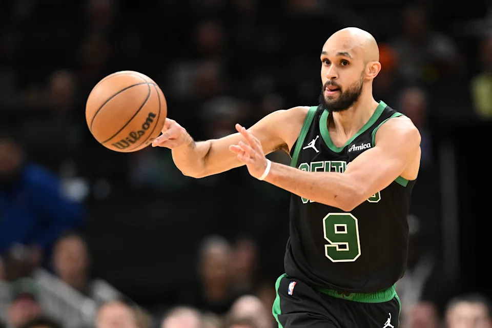 Jan 10, 2026; Boston, Massachusetts, USA; Boston Celtics guard Derrick White (9) passes the ball against the San Antonio Spurs during the second half at the TD Garden. Mandatory Credit: Brian Fluharty-Imagn Images