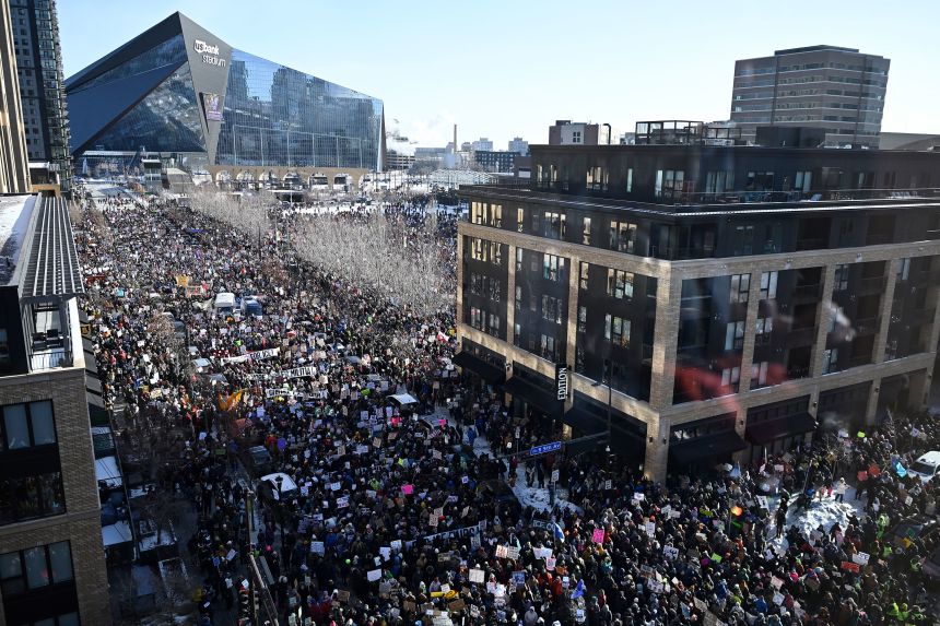 Demonstrators participate in a rally and march during an