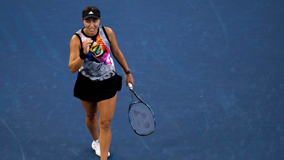 Jessica Pegula smiles after hitting a shot. American tennis star Jessica Pegula smiles after hitting a shot.