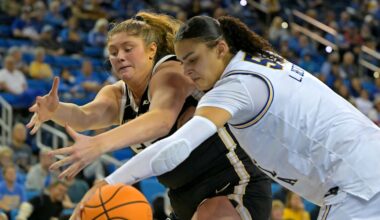 Jan 21, 2026; Los Angeles, California, USA;  Purdue Boilermakers forward Avery Gordon (55) and UCLA Bruins center Lauren Betts (51) reach for a loose ball in the second half at Pauley Pavilion presented by Wescom Financial. Mandatory Credit: Jayne Kamin-Oncea-Imagn Images