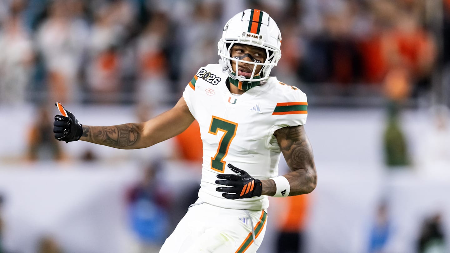 Jan 8, 2026; Glendale, AZ, USA; Miami Hurricanes wide receiver CJ Daniels (7) celebrates after defeating the Mississippi Rebels during the 2026 Fiesta Bowl and semifinal game of the College Football Playoff at State Farm Stadium. Mandatory Credit: Mark J. Rebilas-Imagn Images