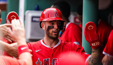Jun 4, 2025; Boston, Massachusetts, USA; Los Angeles Angels shortstop Zach Neto (9) is congratulated after scoring against the Boston Red Sox in the second inning at Fenway Park. Mandatory Credit: David Butler II-Imagn Images