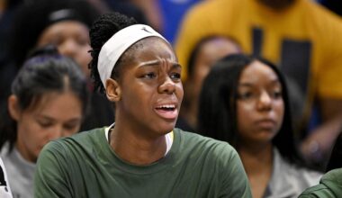 May 19, 2025; Arlington, Texas, USA;  Seattle Storm center Dominique Malonga (14) looks on from the team bench during the second half against the Dallas Wings at College Park Center. Mandatory Credit: Jerome Miron-Imagn Images