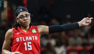 Aug 23, 2025; College Park, Georgia, USA; Atlanta Dream guard Allisha Gray (15) celebrates a three point shot against the New York Liberty during the first quarter at Gateway Center Arena at College Park. Mandatory Credit: Jordan Godfree-Imagn Images