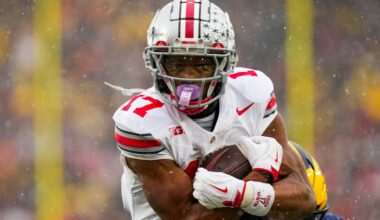 Ohio State Buckeyes wide receiver Carnell Tate (17) runs in a touchdown against the Michigan Wolverines in the second half of the NCAA football game at Michigan Stadium on Saturday, Nov. 29, 2025 in Ann Arbor, Michigan.