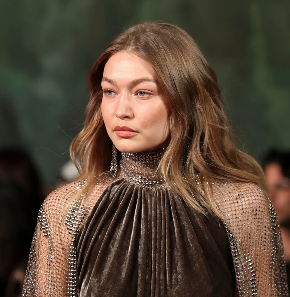 Gigi walking a runway