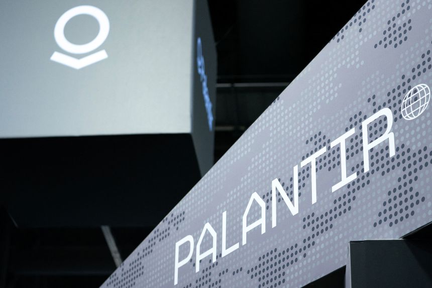 Signage for Palantir is seen during the Association of the United States Army annual meeting and exposition in Washington, DC, in October 2024.