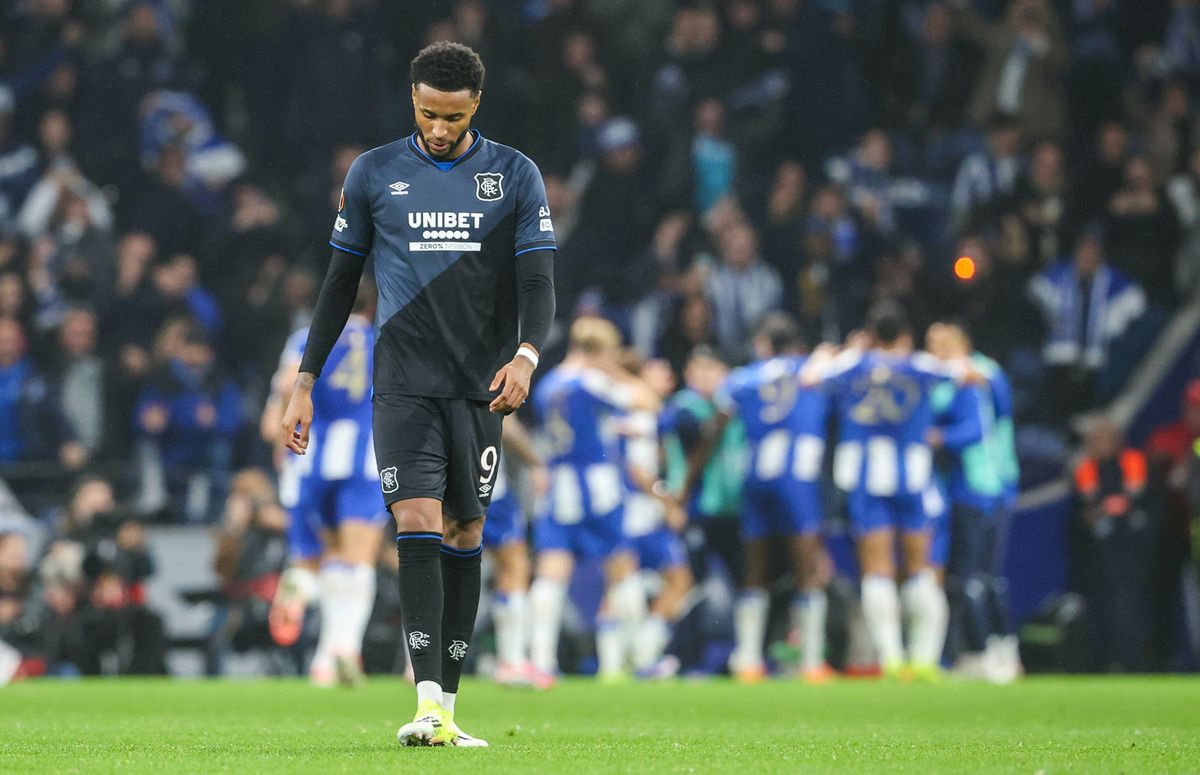 Rangers' Youssef Chermiti looks dejected after Porto's Francisco Moura scores to make it 2-1