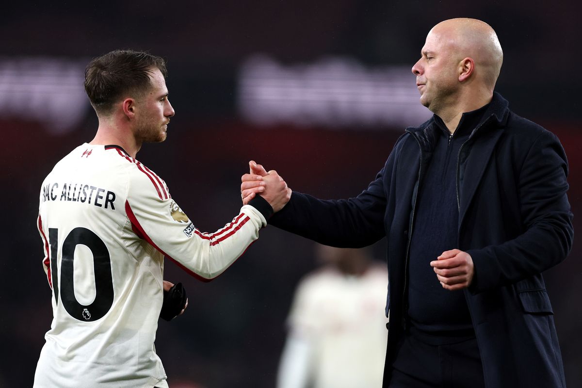 Liverpool head coach Arne Slot with midfielder Alexis Mac Allister