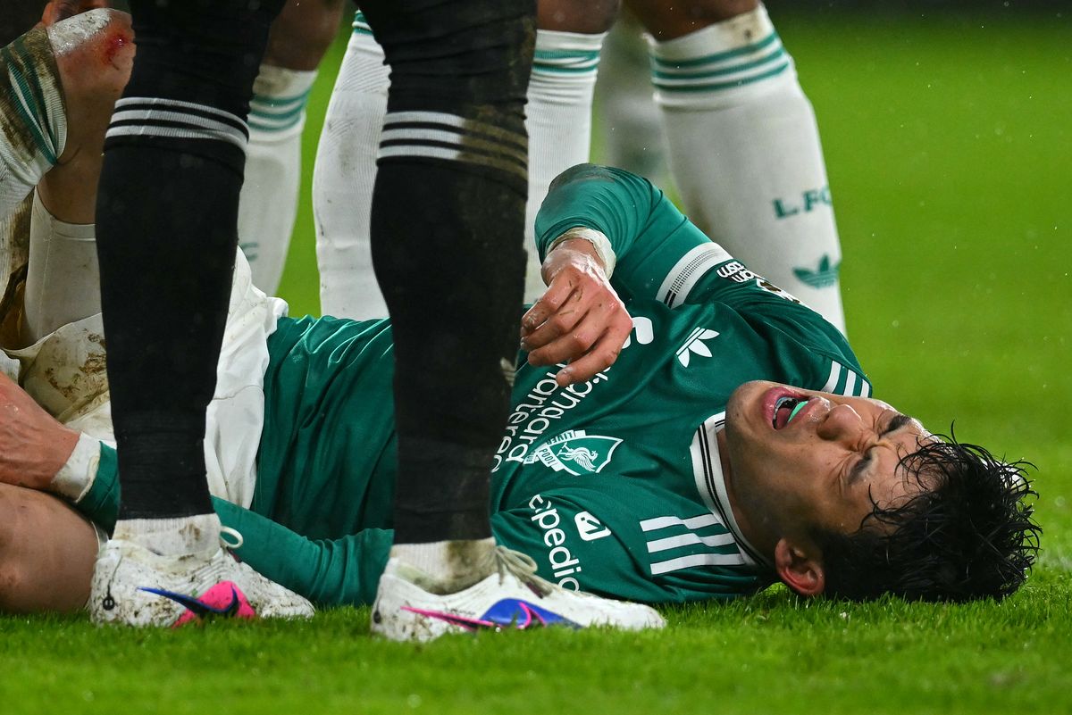 Liverpool's Japanese midfielder #03 Wataru Endo lays on the pitch injured during the English Premier League football match between Sunderland and Liverpool at The Stadium of Light in Sunderland in north east England on February 11, 2026. (Photo by ANDY BUCHANAN / AFP via Getty Images) / RESTRICTED TO EDITORIAL USE. No use with unauthorized audio, video, data, fixture lists, club/league logos or 'live' services. Online in-match use limited to 120 images. An additional 40 images may be used in extra time. No video emulation. Social media in-match use limited to 120 images. An additional 40 images may be used in extra time. No use in betting publications, games or single club/league/player publications. / 