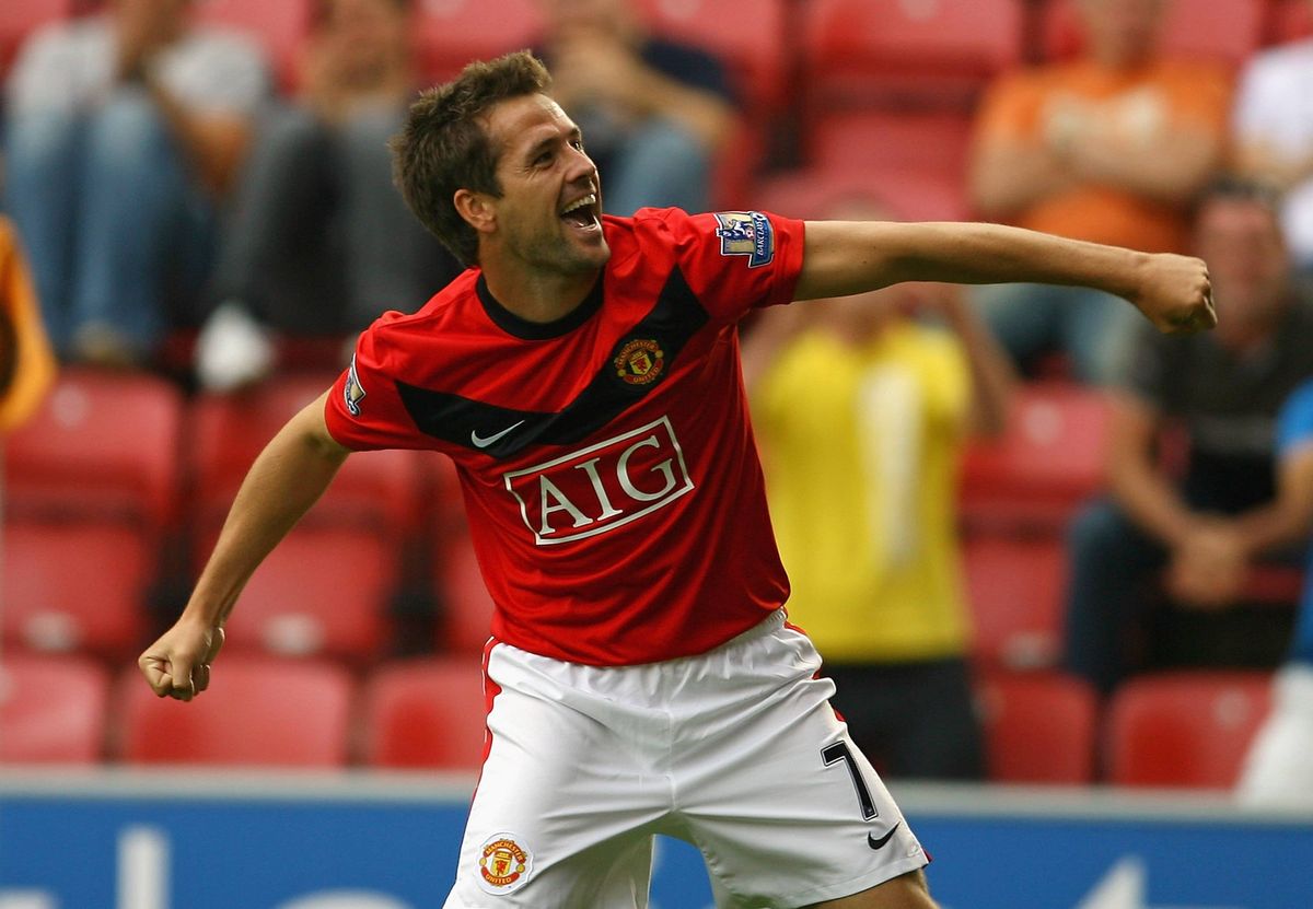 Michael Owen of Manchester United celebrates after scoring the 4:0 goal during the Barclays Premier League match between Wigan Athletic and Manchester United at the DW Stadium on August 22, 2009 in Wigan, England.