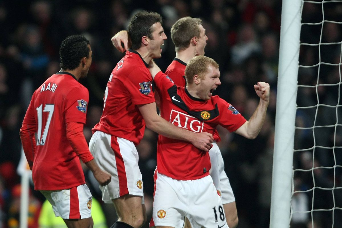 Paul Scholes of Manchester United celebrates scoring their first goal during the Carling Cup Semi-Final Second Leg match between Manchester United and Manchester City at Old Trafford on January 27 2010 in Manchester, England.
