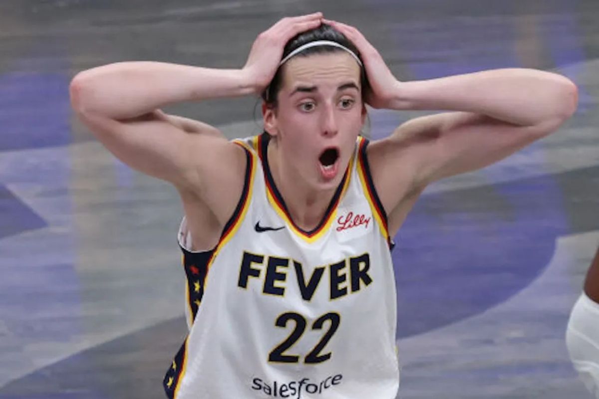 Indiana Fever guard Caitlin Clark appears shocked at a call during a WNBA game
