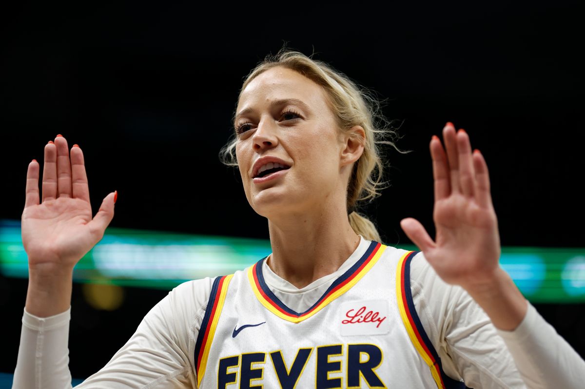 Former Indiana Fever player Sophie Cunningham puts her hands up