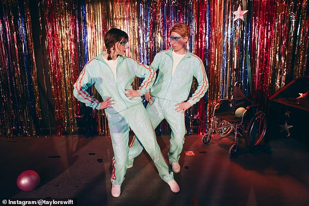 During the video Taylor and Domhnall's character's fall in love before donning blue sparkling tracksuits for an iconic dance number