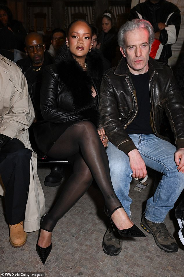 Rocky's significant other - who he's referred to as his 'wife' - was the center of attention as she posed next to Interview magazine editor-in-chief Mel Ottenberg on her left