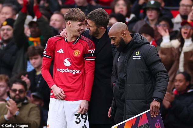 The United boss shares a joke with Tyler Fletcher before handing the midfielder his United debut against Tottenham