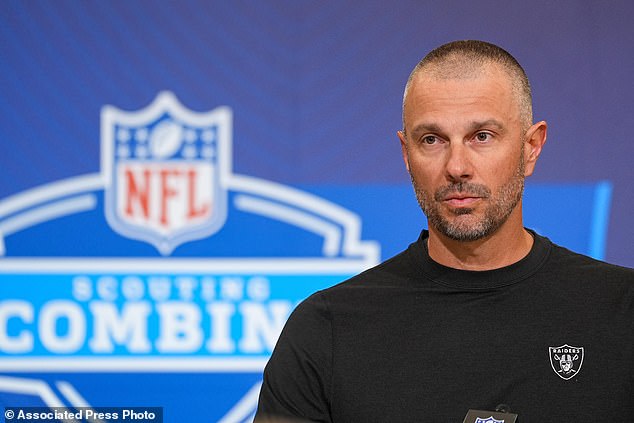 Raiders general manager John Spytek speaks at the scouting combine in Indianapolis