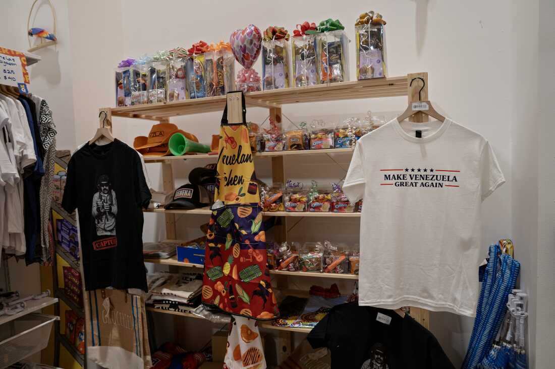 T-shirts celebrating the U.S. capture of Venezuelan President Nicols Maduro and other wares for sale on January 14, 2026, at Mi Querencia Latin Market in Katy, Texas.