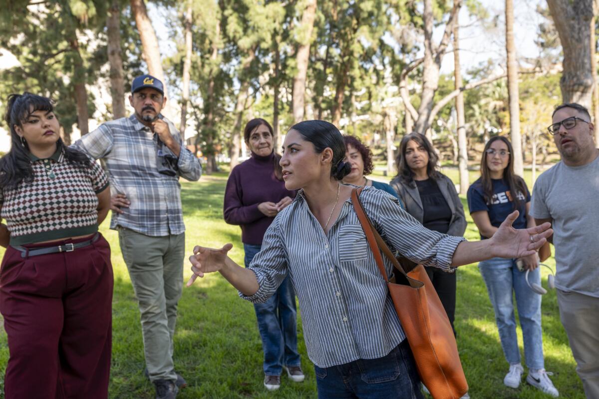 Joseline Garcia, a community activist from Mijente speaks to other community organizers.
