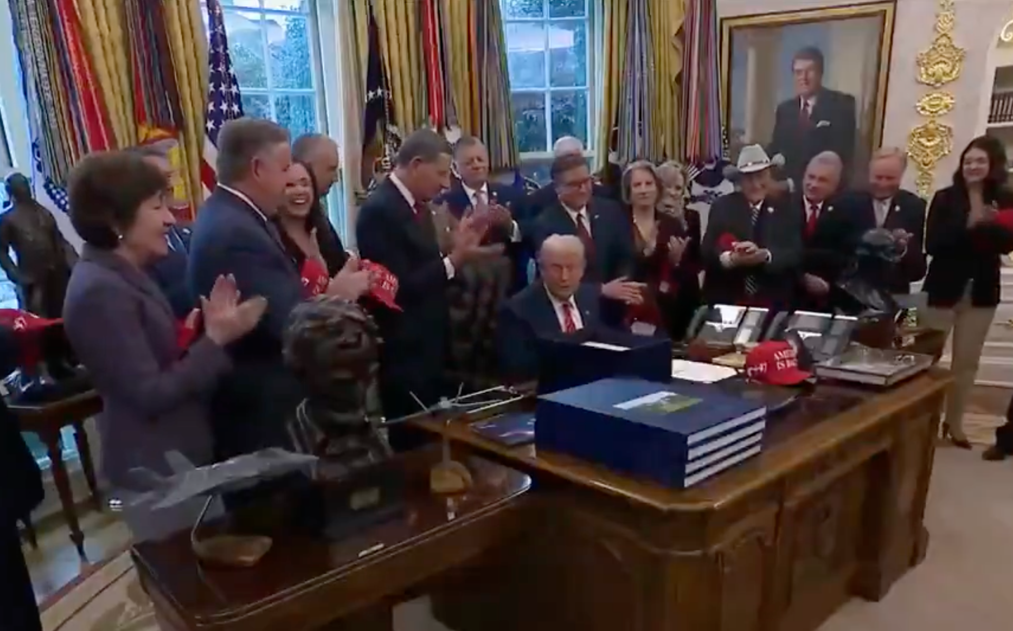 President signed the bill in the Oval Office on Tuesday- photo White House