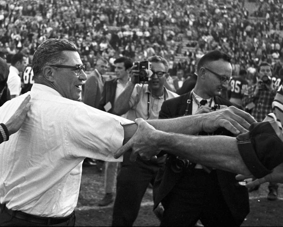 John Biever's favorite photo from Super Bowl I was of Packers Coach Vince Lombardi after the victory and includes his father, Vern Biever, to the right of Lombardi. Biever and his father worked together for the first 35 Super Bowls.