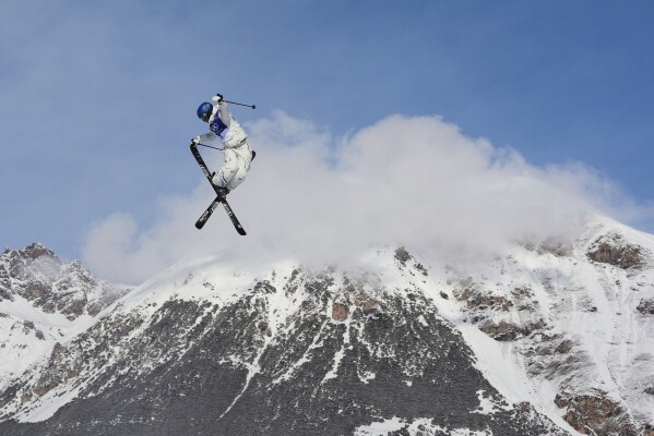 China's Eileen Gu practices during a freestyle skiing slopestyle training session at the 2026 Winter Olympics, in Livigno, Italy, Feb. 5, 2026. (AP Photo/Lindsey Wasson, File)