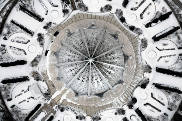 An aerial view of the Baháʼí House of Worship in Wilmette, Ill., on a snowy Jan. 30, 2026. (AP Photo/Erin Hooley, File)