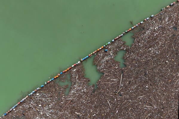 An aerial view of waste clogging the Drina river in Visegrad, Bosnia, Feb. 5, 2026. (AP Photo/Armin Durgut, File)