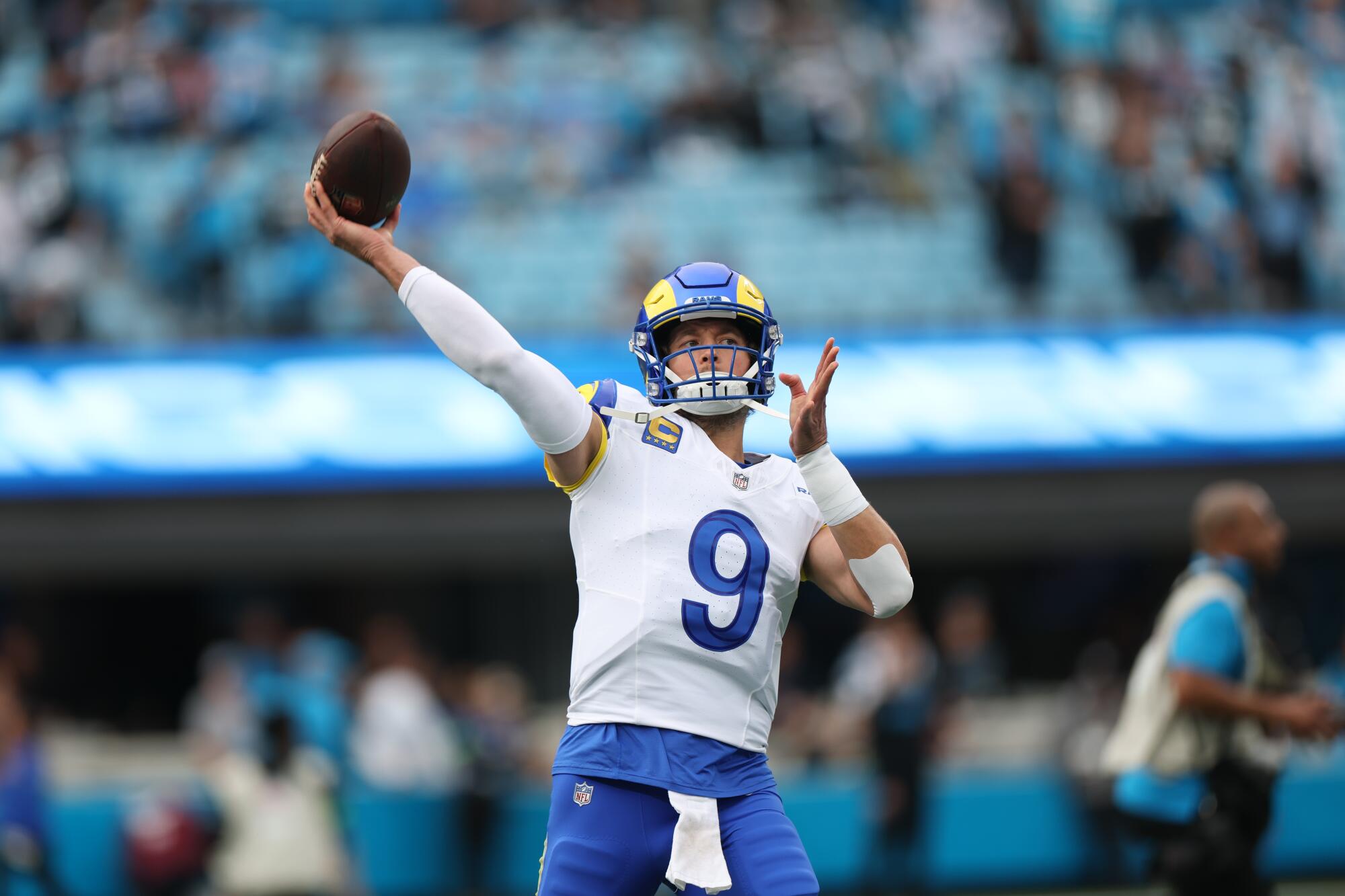 Rams quarterback Matthew Stafford warms up before facing the Carolina Panthers in the NFC playoffs.
