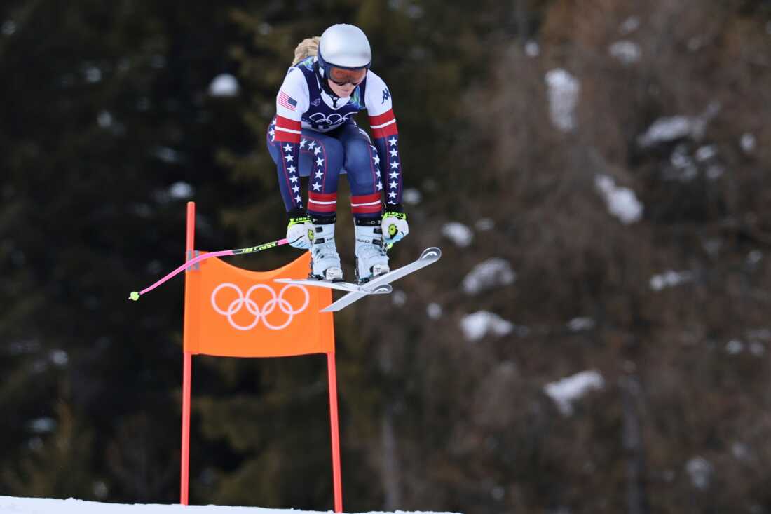 United States' Lindsey Vonn speeds down the course during an alpine ski, women's downhill official training, at the 2026 Winter Olympics, in Cortina d'Ampezzo, Italy, Friday, Feb. 6, 2026. (AP Photo/Marco Trovati)