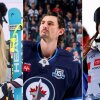 Side-by-side photos of Alpine skiier Lindsey Vonn, NHL player Connor Hellebuyck and halfpipe snowboarder Chloe Kim.