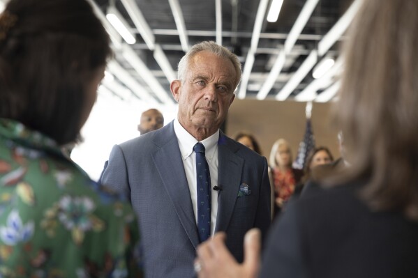 FILE - Health Secretary Robert F. Kennedy Jr. visits University of Utah to discuss Utah's new fluoride ban and food additives legislation, April 7, 2025, in Salt Lake City. (AP Photo/Melissa Majchrzak)