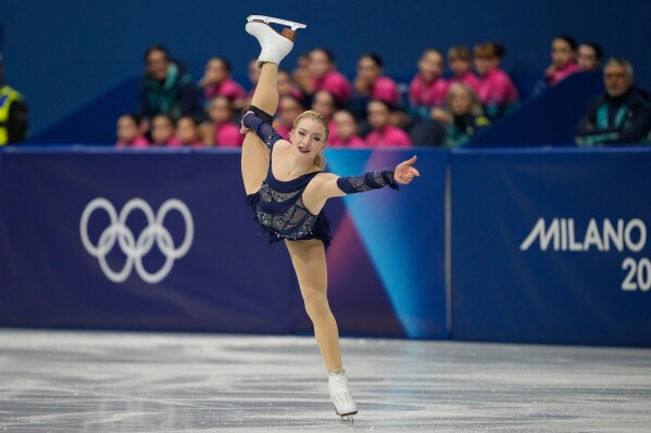 Amber Glenn of the United States competes during the figure skating women's team event at the 2026 Winter Olympics, in Milan, Italy, Sunday, Feb. 8, 2026. (AP Photo/Ashley Landis)