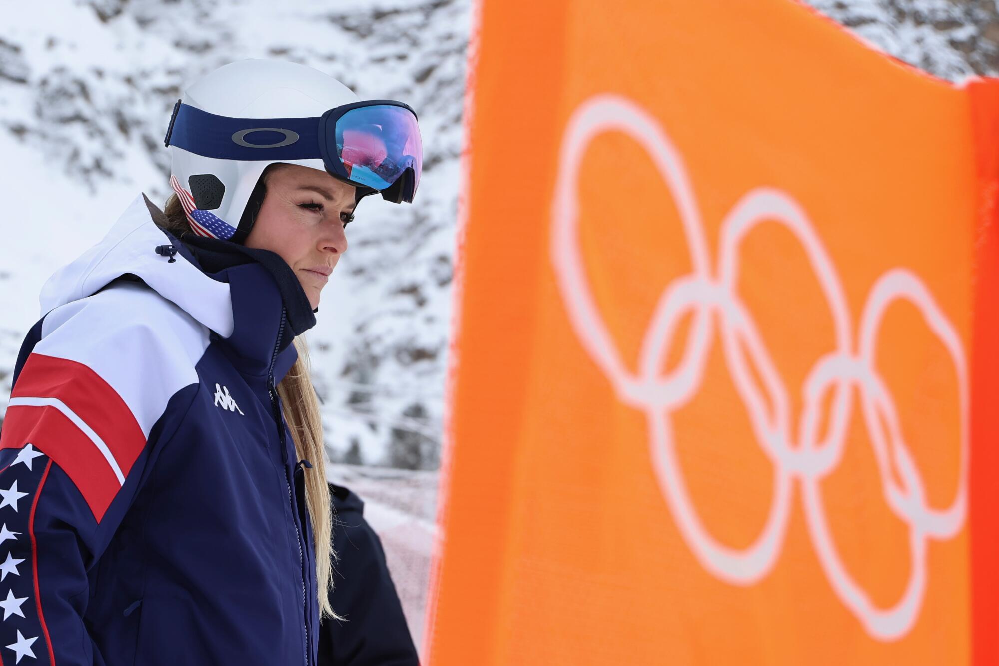 American Lindsey Vonn looks focused ahead of an alpine ski downhill training session in Cortina d'Ampezzo, Italy.