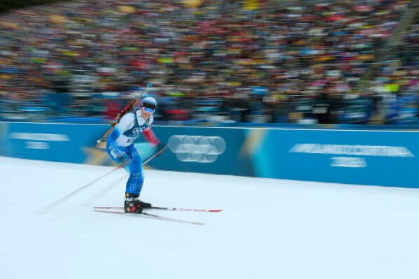 Sondre Slettemark, of Denmark, competes in the men's 20-kilometer individual biathlon race at the 2026 Winter Olympics in Anterselva, Italy, Tuesday, Feb. 10, 2026. (AP Photo/Mosa'ab Elshamy)