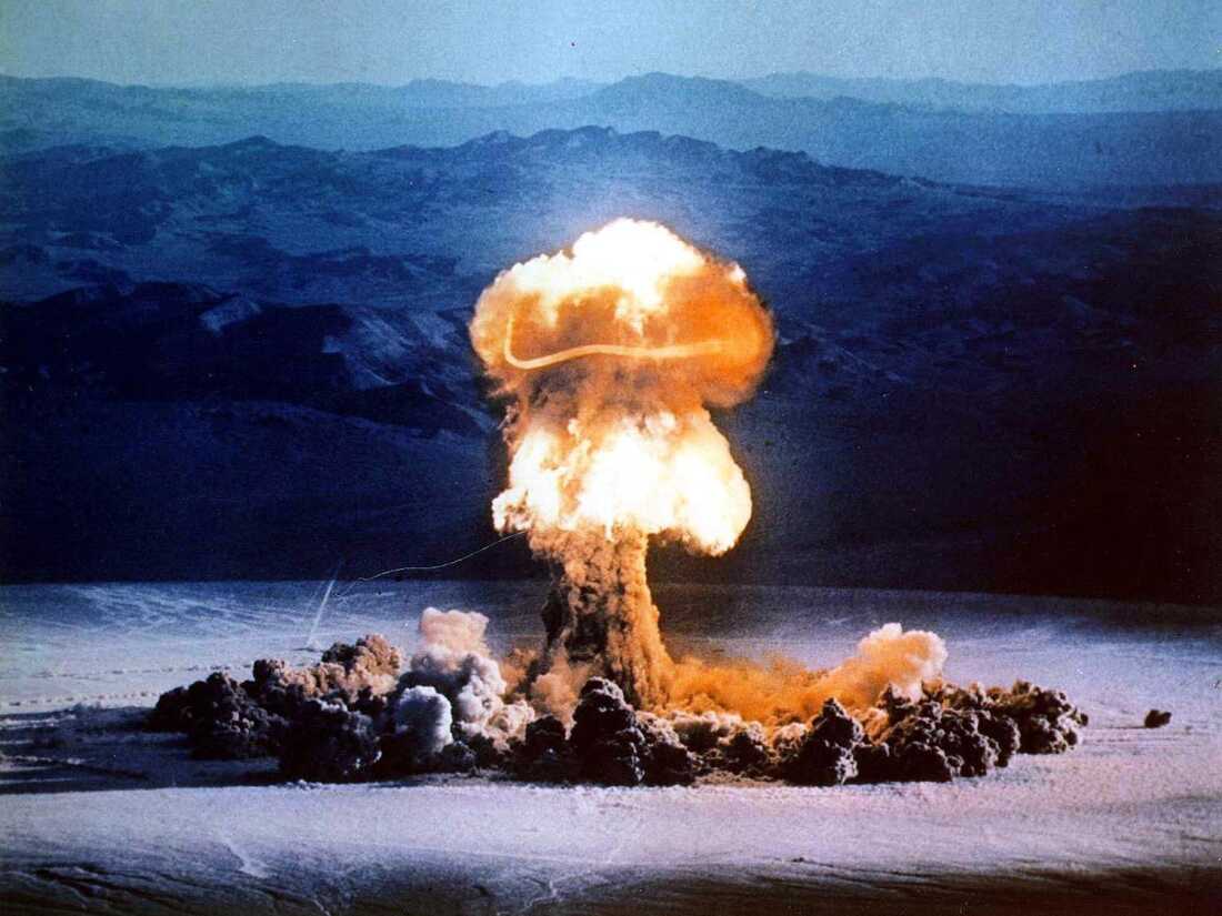 A mushroom cloud rises from a test blast at the Nevada Test Site on June 24, 1957.