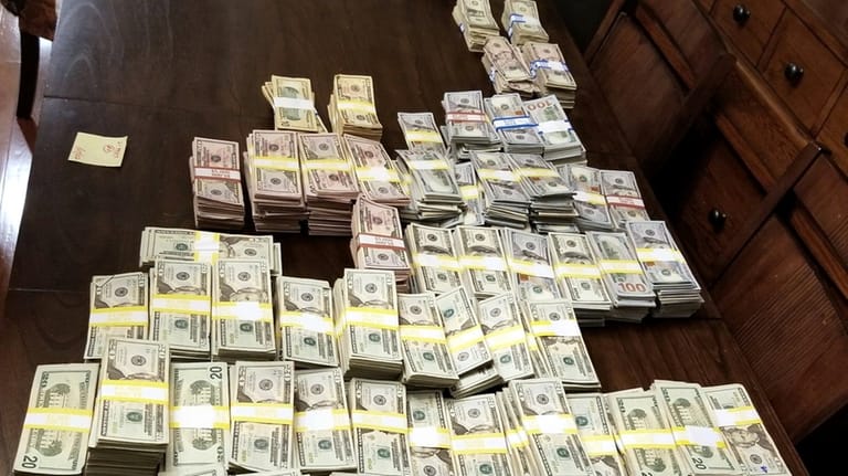 Police seized $900,000 in cash in connection with the Wild...
