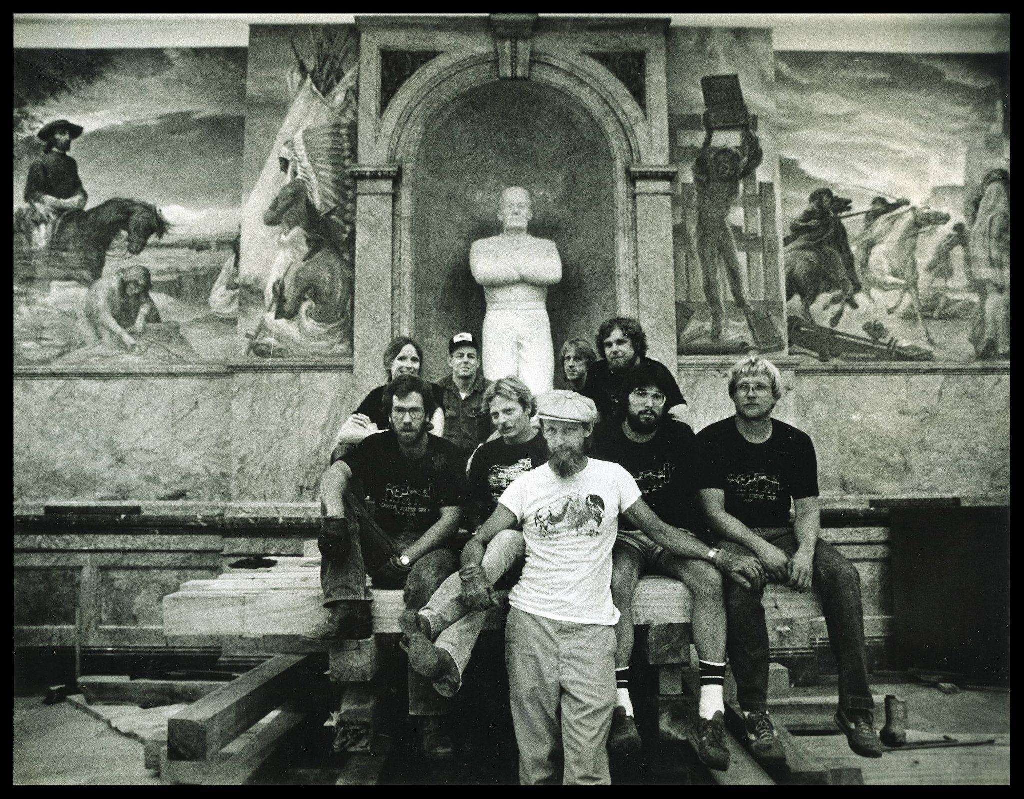 Pete Felten, center, as his sculptures in the rotunda of the Kansas Capitol were installed in 1981. Courtesy photo