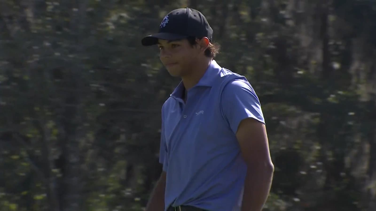 Charlie Woods walks in birdie putt at PNC Championship pro-am